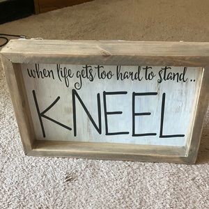 Kneel wooden sign